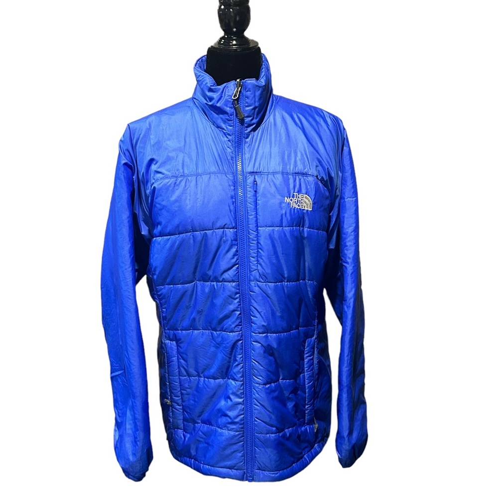 North face blue light puffer jacket.